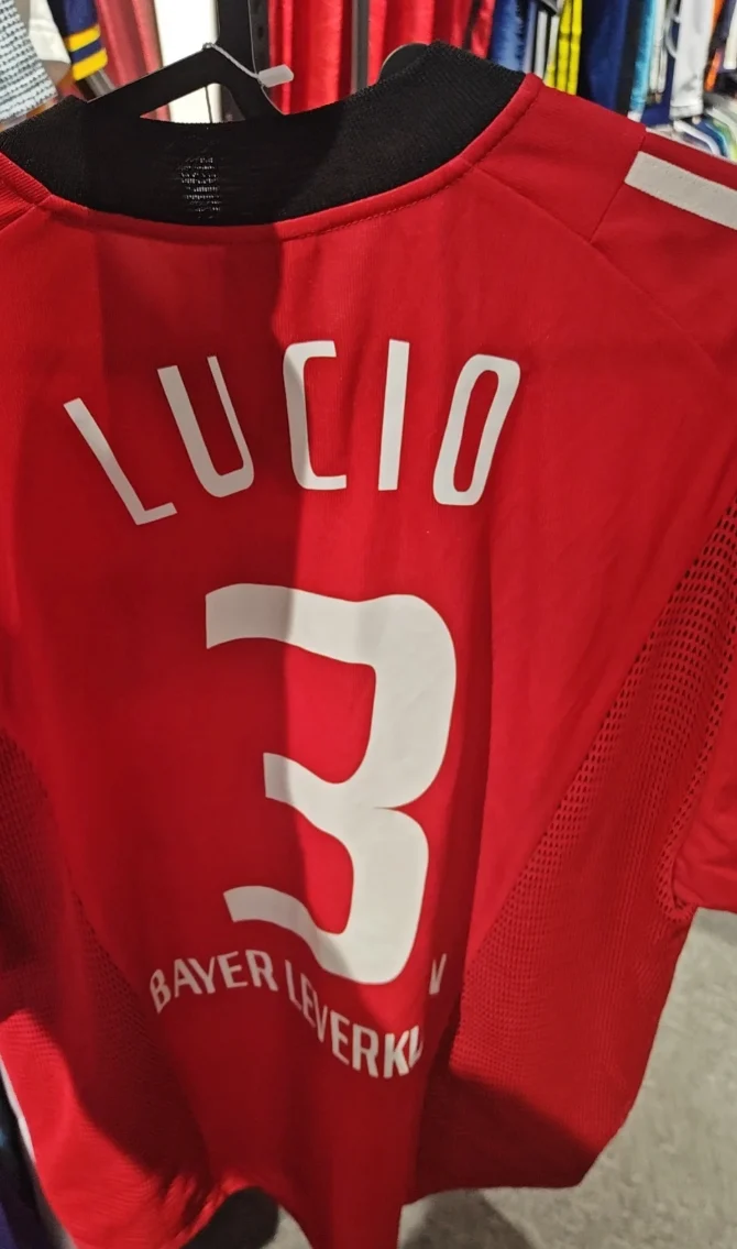 White name and number on a red jersey.